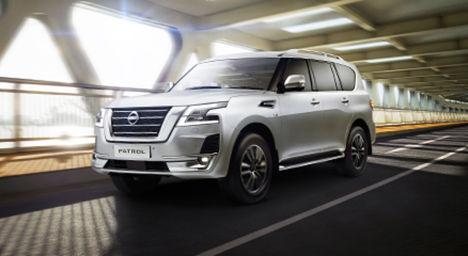 Nissan Patrol driving under bridge